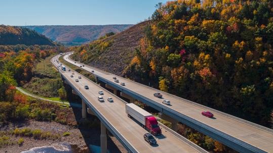 Truck and cars on highway